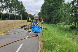 Lading kleine vuilniswagen in brand in Zuidschermer