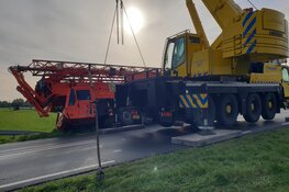 Telekraan hijst telekraan bij De Woude