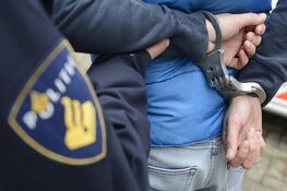 Man aangehouden voor drugshandel, verboden vuurwapenbezit en witwassen, op 12 panden beslag gelegd